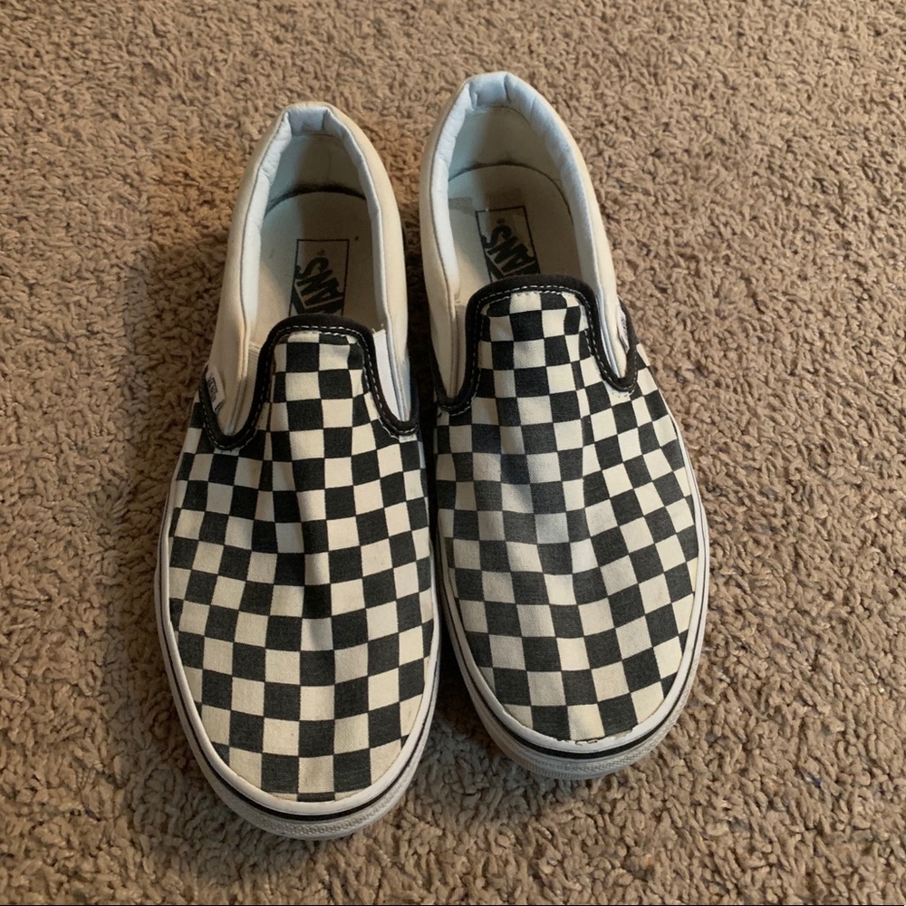 Checkered Vans slip ons